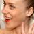 Chloe Sevigny wears the bright red lipstick trend