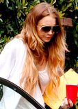Lindsay Lohan wears ripped jeans: Maxfield, Los Angeles, April 2009