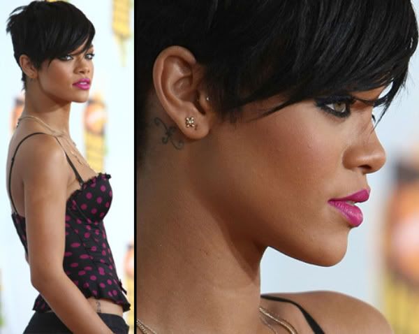 Rihanna in pink lipstick and spotted bustier
