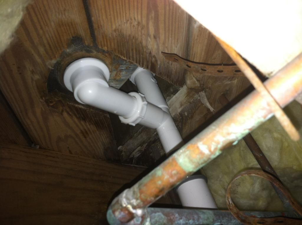 A WTF plastic fitting on old cast iron. Tub drain Terry Love Plumbing & Remodel DIY